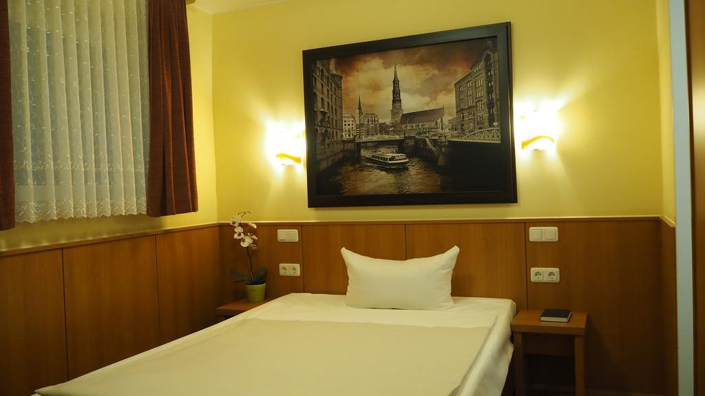 Altan Hotel Hamburg Rom bilde